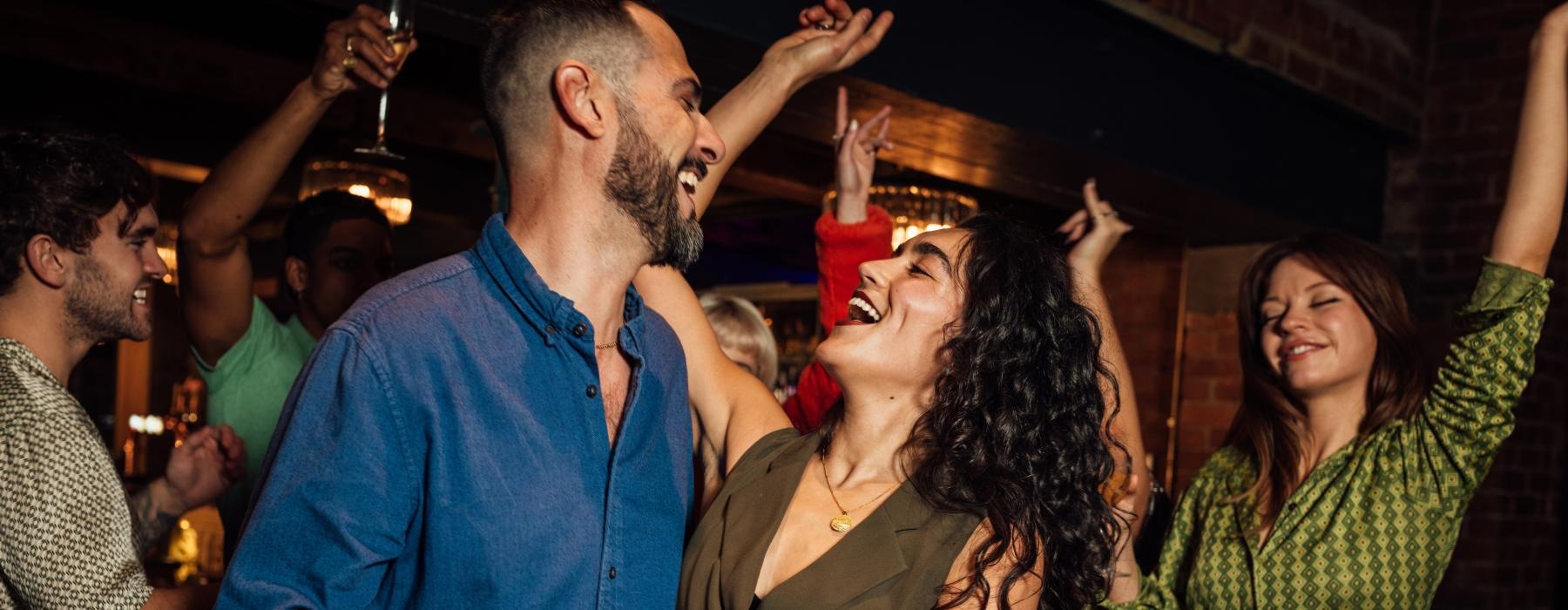 a man and woman dancing