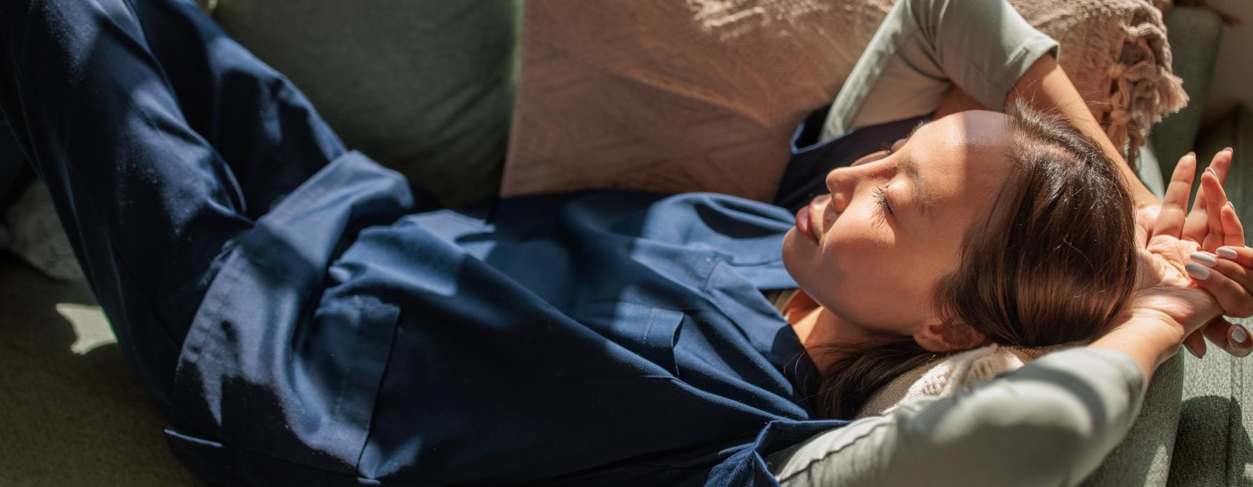 a person sleeping on a couch