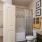 a bathroom with a shower and toilet