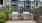 a group of buildings with a fence