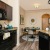 a kitchen with black appliances