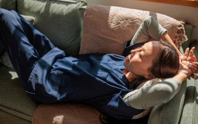 a person sleeping on a couch