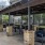 a patio with chairs and tables