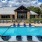 a swimming pool in front of a building