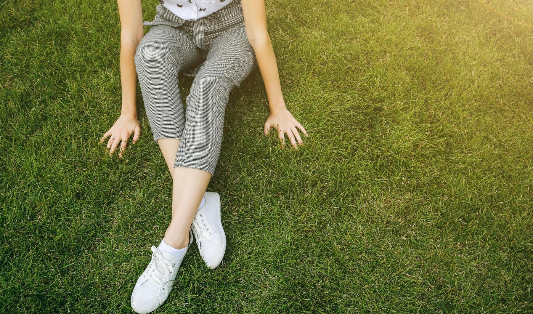 a person standing on grass